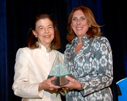 Barnett, left, receives her award from Roberta D. Liebenberg, chair of the ABA Commission on Women in the profession.