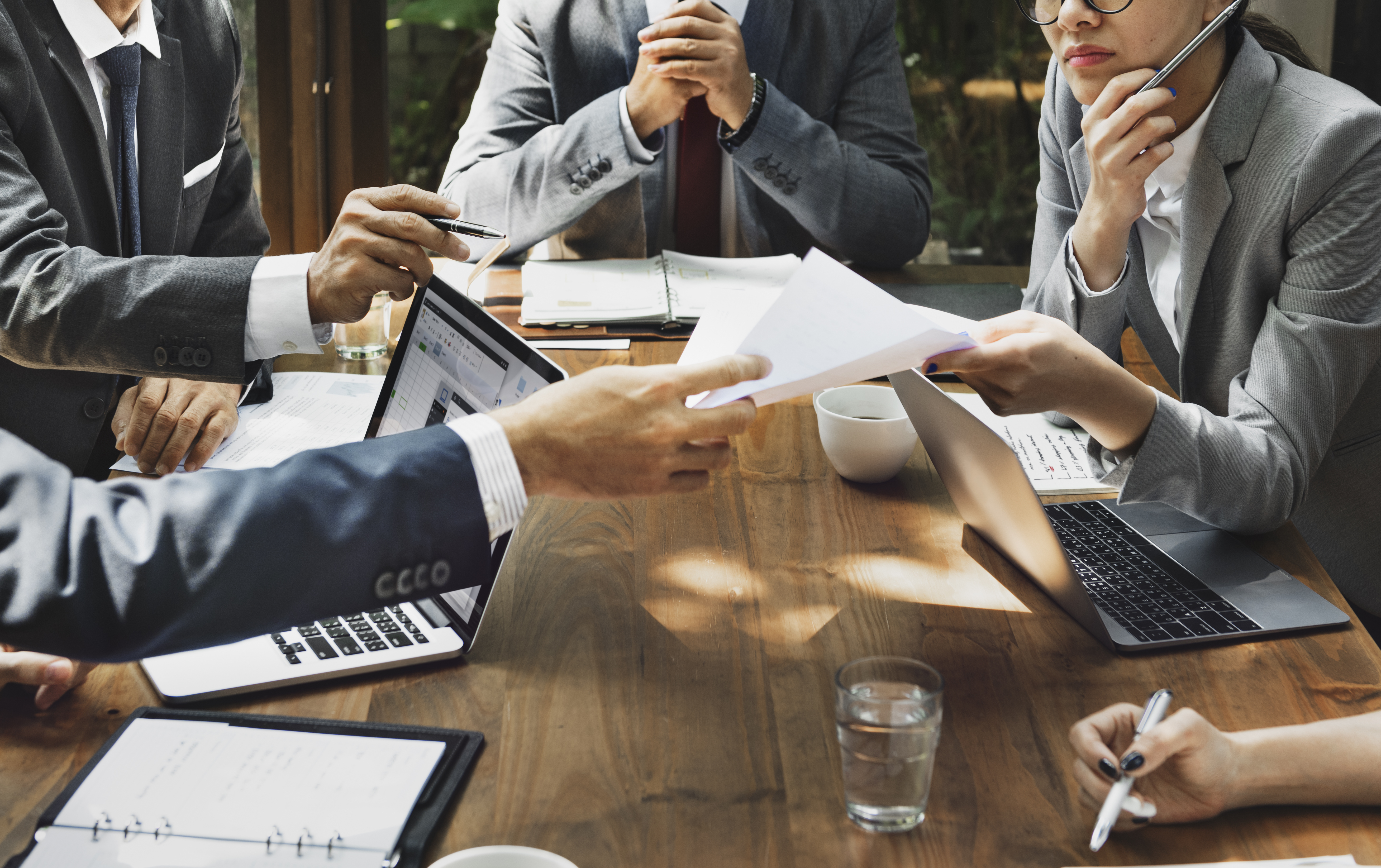 photo of people working at a table