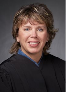 Headshot of Associate Justice Anne McKeig