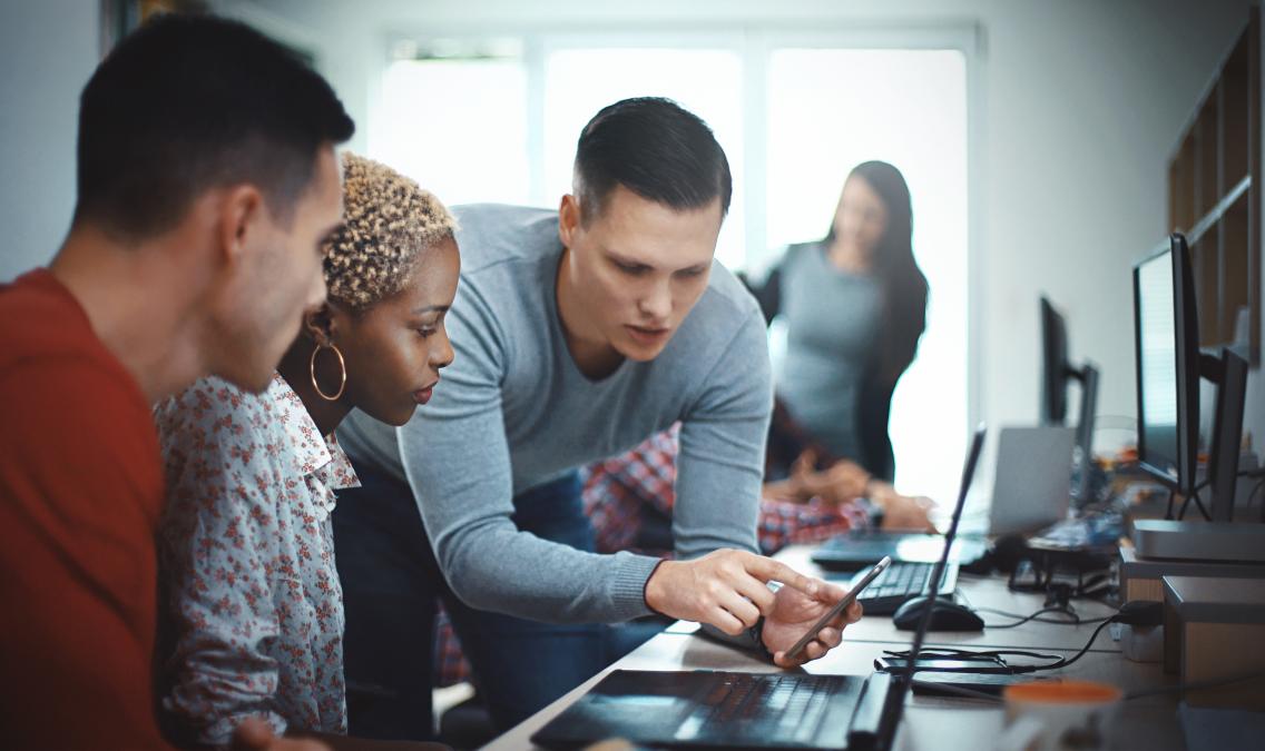 team working on the computer